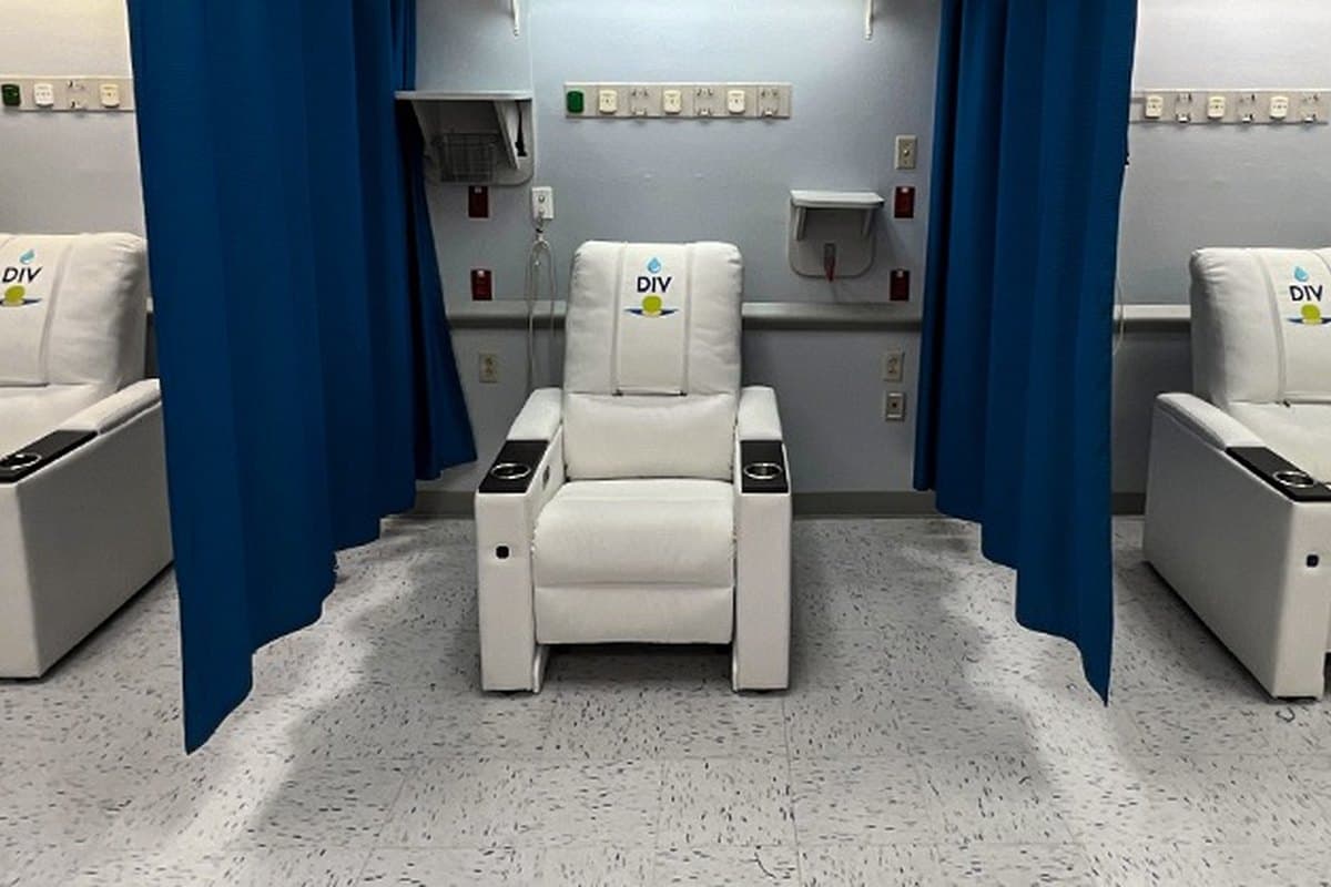 Modern IV therapy suite with treatment chairs